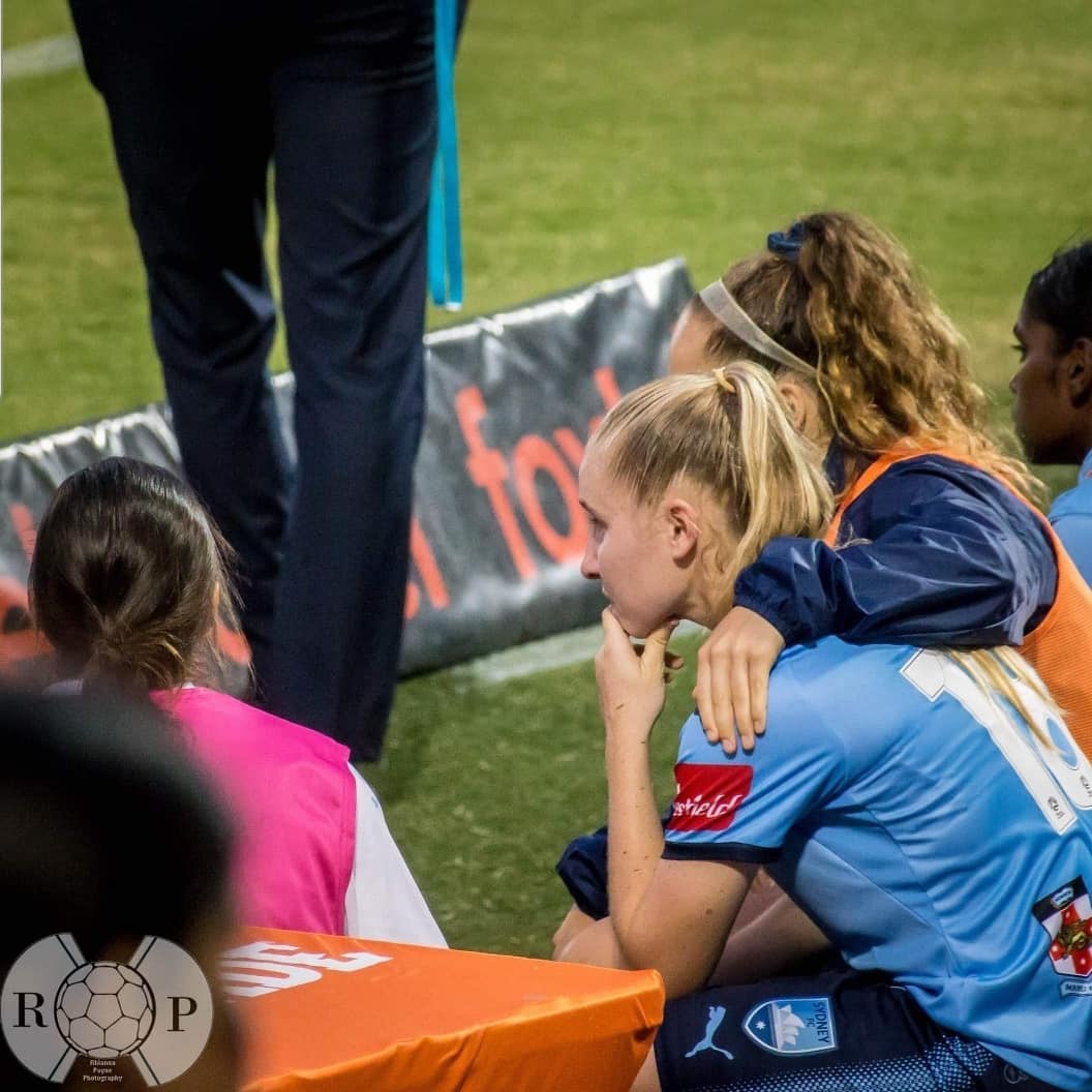 Taylor Ray being comforted by Sydney FC teammate Julia Vignes - Rhianna Payne