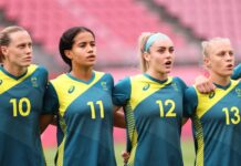KASHIMA, JAPAN - JULY 27: (L-R) Emily Van Egmond #10, Mary Fowler #11, Ellie Carpenter #12 and Tameka Yallop #13 of Team Australia line up prior the Women's Football Group G match between United States and Australia on day four of the Tokyo 2020 Olympic Games at Kashima Stadium on July 27, 2021 in Kashima, Ibaraki, Japan. (Photo by Atsushi Tomura/Getty Images)