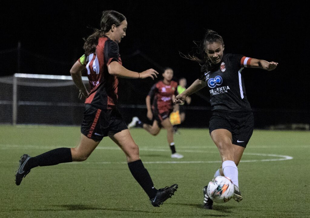 NPLW WA Round 2: Perth RedStar captain Jay Coleman (r) and MUM FC captain Charli Wainwright tussle for the ball. Image Credit Perth RedStar/Robbie Anderson