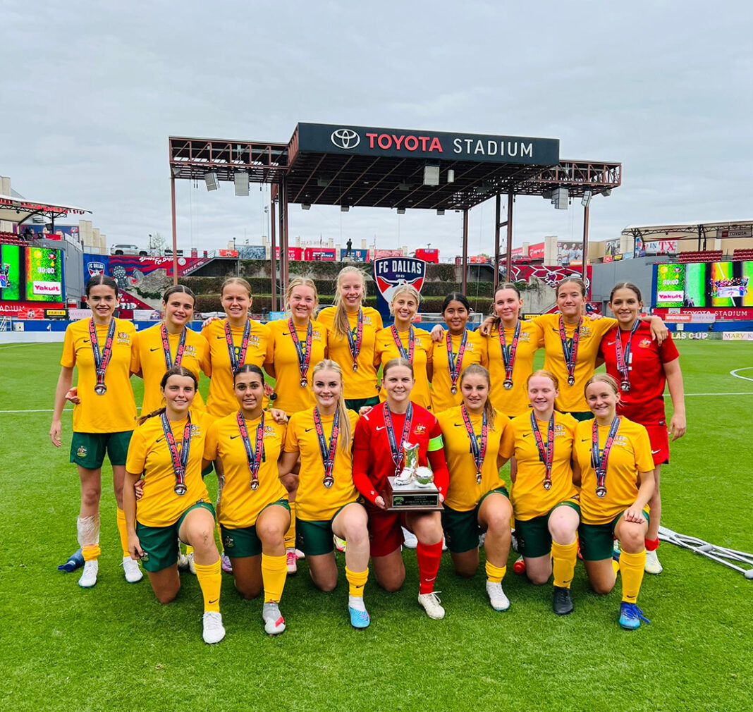 The Australian U19 Schoolgirls team with their runners up trophy in the Dallas Cup. Image Credit Matt Visinsky