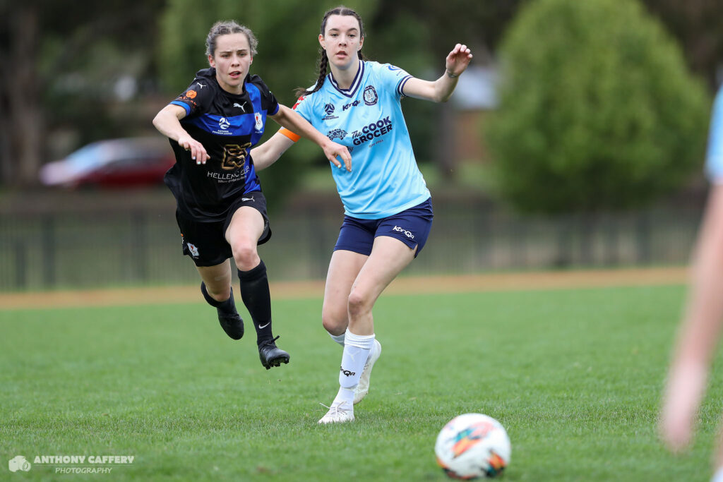 2023 ACT NPL: Maddy Whittall leaps by Talia Backhouse. Photo: Anthony Caffery Photography