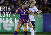PERTH, AUSTRALIA - NOVEMBER 11: Natasha Rigby of the Glory controls the ball under pressure from Dylan Holmes of the Reds during the A-League Women round four match between Perth Glory and Adelaide United at Macedonia Park, on November 11, 2023, in Perth, Australia. (Photo by Will Russell/Getty Images)