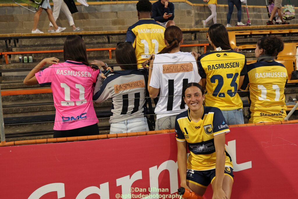 Annalise Rasmussen poses with her fans (some of them in home made custom jerseys!) after the A-League Women semi final 2nd leg between Sydney FC and Central Coast Mariners, played at Leichhardt Oval on April 27, 2024. Photo credit: Dan Ullman (Instagram - @aptitudephotography )