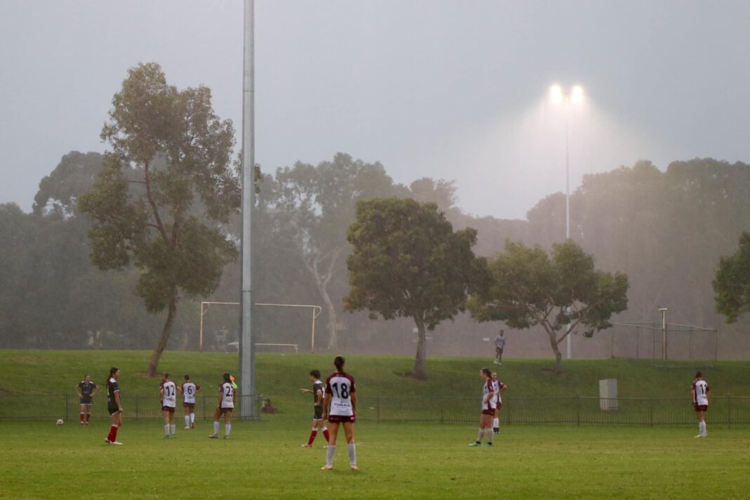 Winter rain at Subiaco's Rosalie Park for the Subiaco vs Perth RedStar Rd 8 clash. Image credit Denys RM Photography