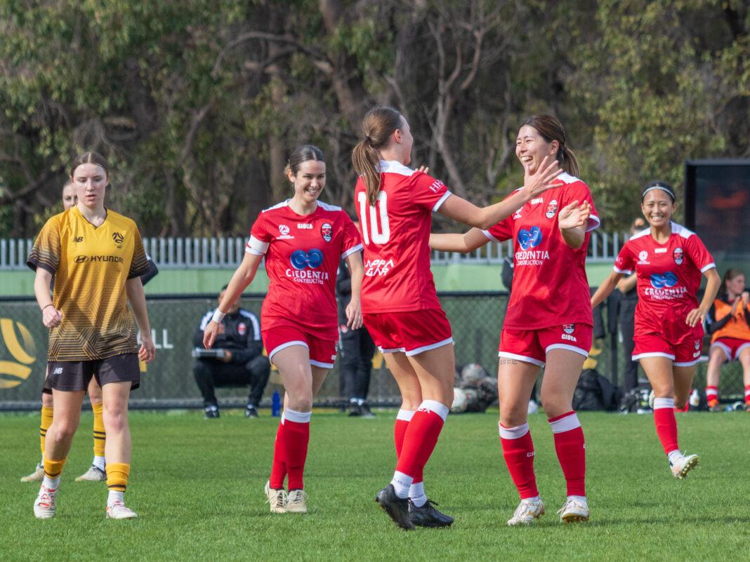 erth RedStar's Reina Kagami being congratulated after scoring a goal against Hyundai NTC in the RD 14 NPLW WA clash at the Same Kerr Football Centre. Image Credit Perth RedStar/Neil Bennett