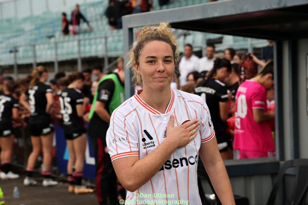 A-League Women Premiership winner, AFLW Premiership winner (x2), Matildas cap 205, Ninja Warrior contestant. Jenna McCormick poses for a photo after the 2023-24 A-League Women game between Western Sydney Wanderers and Brisbane Roar, played at Marconi Stadium. Photo credit: Dan Ullman