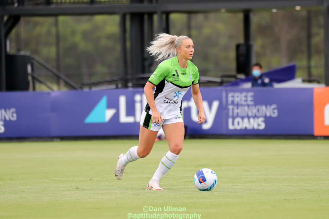 Canberra United's Lauren Keir runs with the ball during the 2021-22 A-League Women game between Perth Glory and Canberra, played at Wanderers Football Park. Photo credit: Dan Ullman (Instagram - @aptitudephotography )