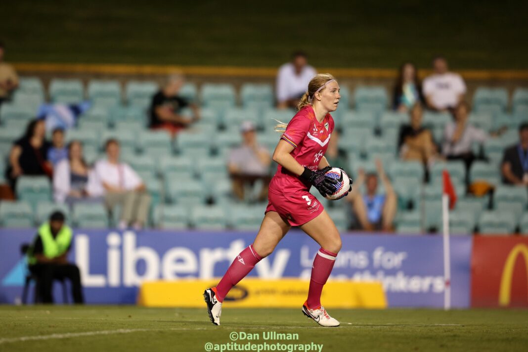 Canberra United goalkeeper Chloe Lincoln looks for options during the 2023-24 A-League Women Unite Round game between Canberra and Adelaide United. Photo credit: Dan Ullman (Instagram - @aptitudephotography )