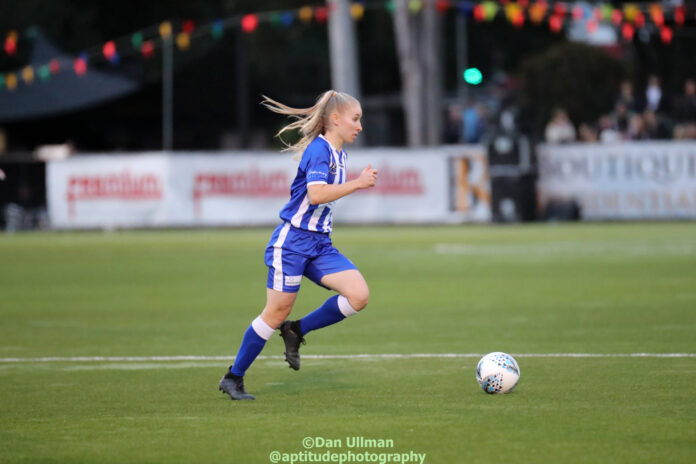 Sydney Olympic midfielder Taylor Ray runs with the ball during the 2021 NPL NSW game between APIA Leichhardt and Olympic at Lambert Park. Photo credit: Dan Ullman (Instagram - @aptitudephotography )