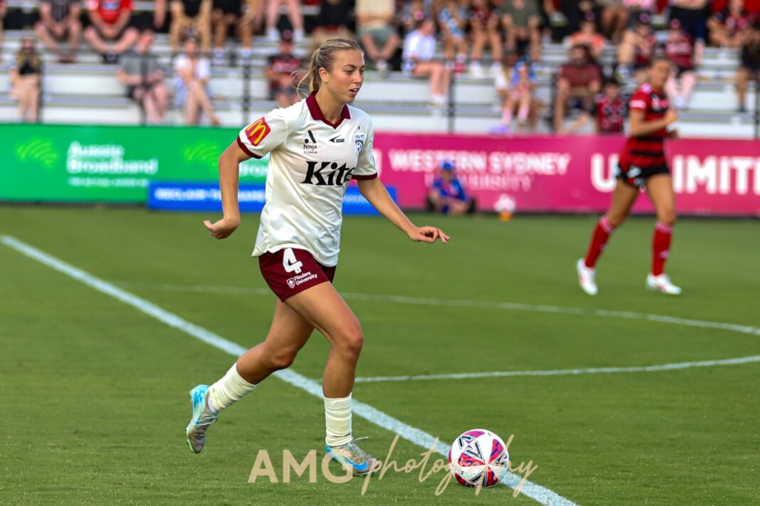 Eric's favourite Matilda: Adelaide United defender Matilda McNamara runs with the ball during the 2024-25 A-League Women game between Western Sydney Wanderers and Adelaide, played at Wanderers Football Park. Photo credit: Angela de Pourbaix (Instagram - @amg_visual_storytelling_ )