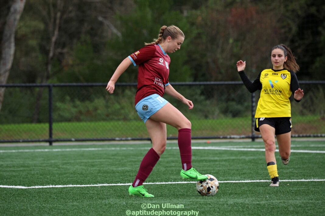 APIA Leichhardt and Mountain Majik Futsal Club legend Ashlie Crofts controls the ball during a 2024 NPL Women's NSW game between Spirit FC and APIA, at Spirit's home ground, which is nicknamed "The Arctic Circle". Photo credit: Dan Ullman (Instagram - @apittudephotography )