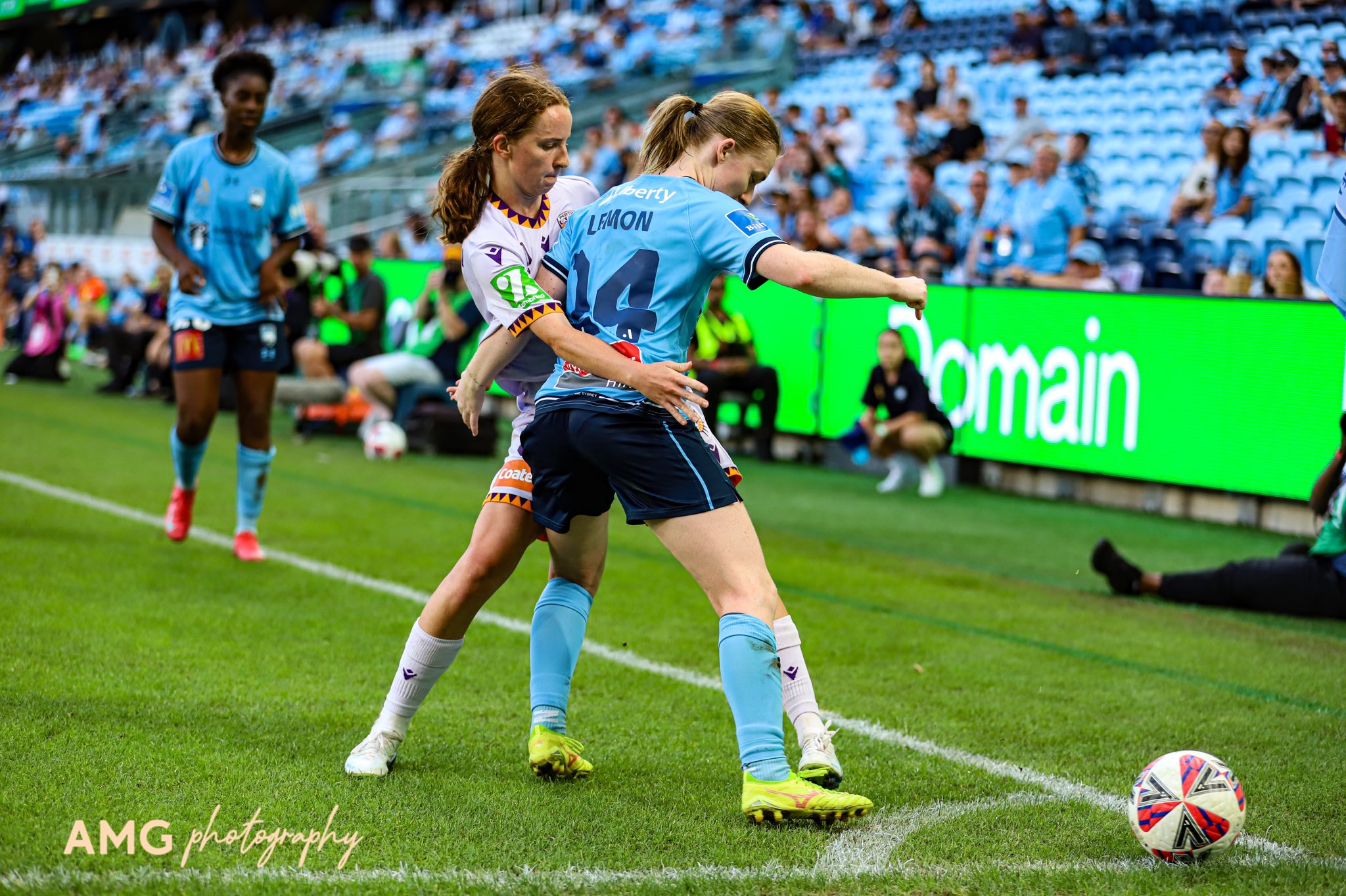 Sydney's Abbey Lemon jostles with Perth's Grace Johnston during the 2024-25 A-League Women game between Sydney and Perth at Allianz Stadium. Photo credit: Angela De Pourbaix (Instagram - @amg_visual_storytelling_ )